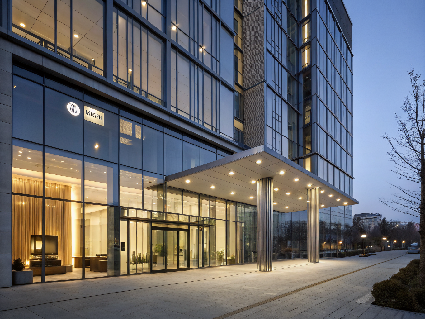 Custom illuminated hotel exterior signage and architectural wayfinding installation